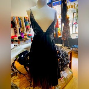 Alexander McQueen women’s leather pleated skirt party dress.